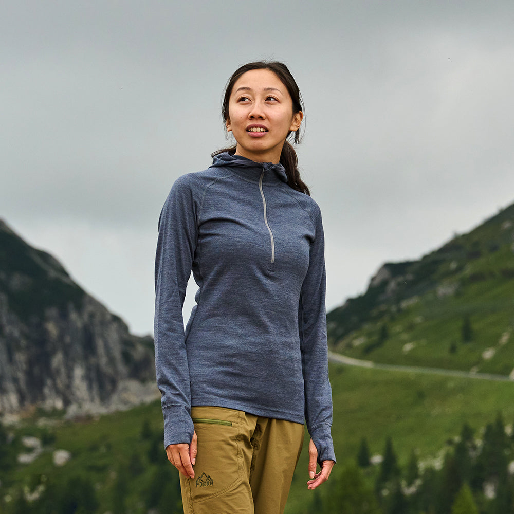 Fjern - Womens Första Merino Blend Long Sleeve Hoodie Baselayer (Storm Grey) | Embark on your next adventure with the Första Hoodie, a lightweight and high-performance technical hoodie