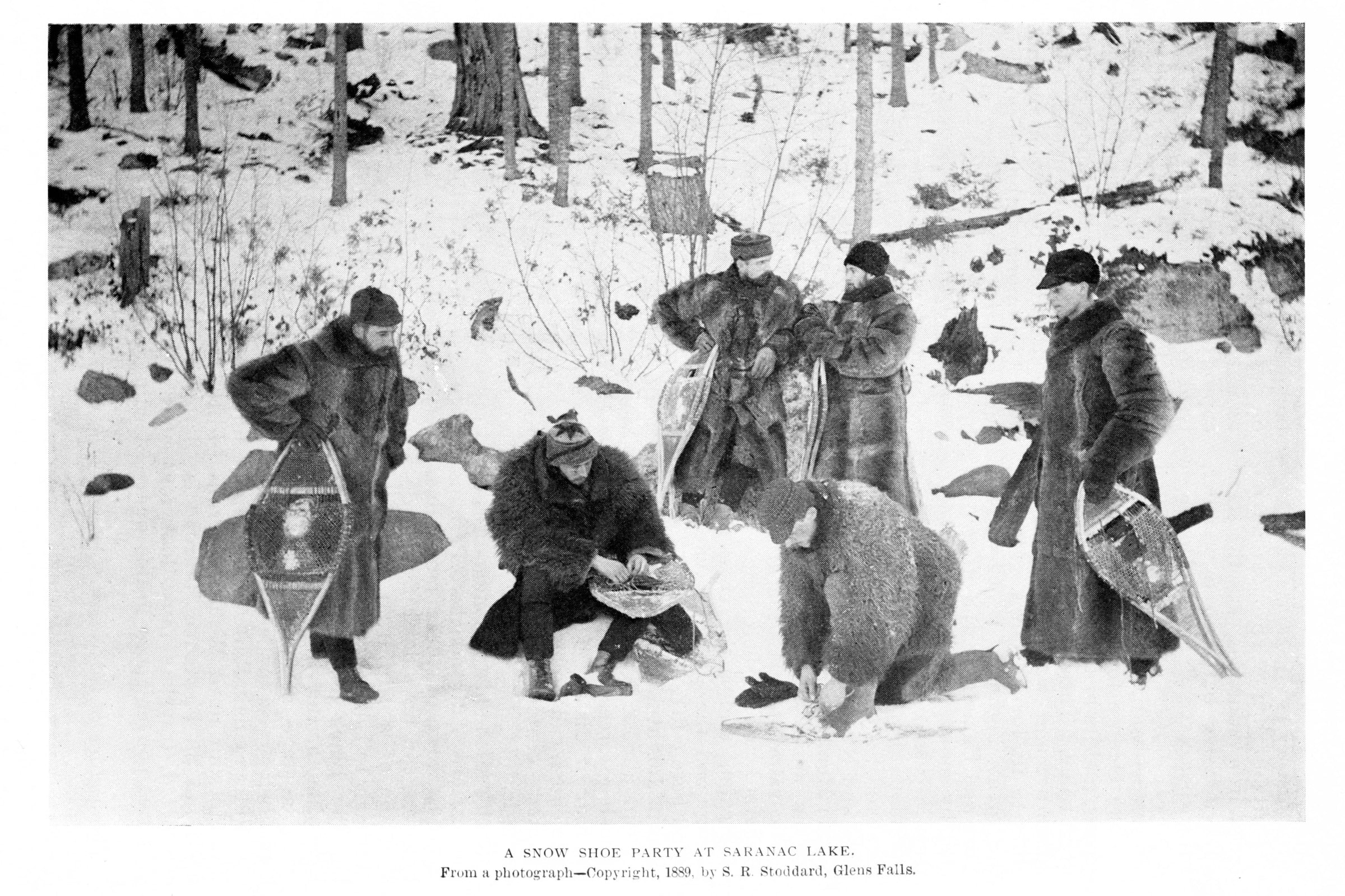 Snowshoe hikers at Saranac Lake in winter